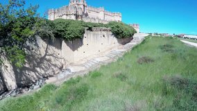Aerial video of Coca Castle (Castillo de Coca) is a fortification constructed in the 15th century and is located in Coca, in Segovia province, Castilla and Leon, Spain. 