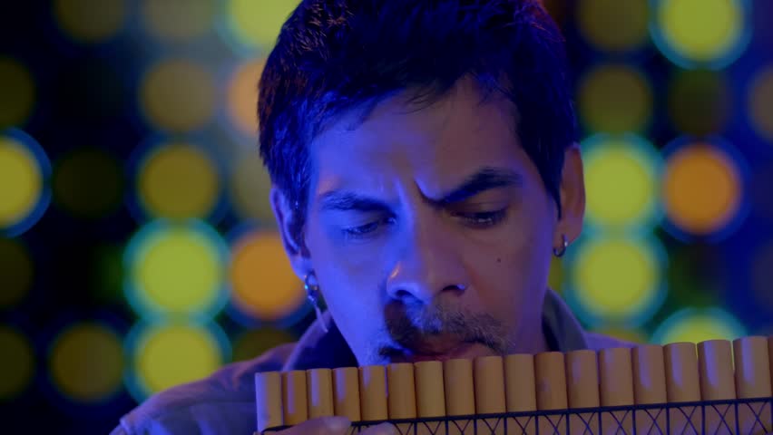 Close Up Shot Of Musician Playing Pan flute Instrument From Andes Of Peru And Bolivia Royalty-Free Stock Footage #1099244927