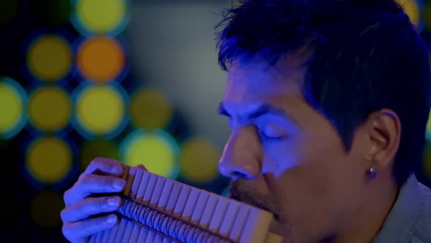 Close Up Shot Of Musician Playing Pan flute Instrument From Andes Of Peru And Bolivia Royalty-Free Stock Footage #1099245119