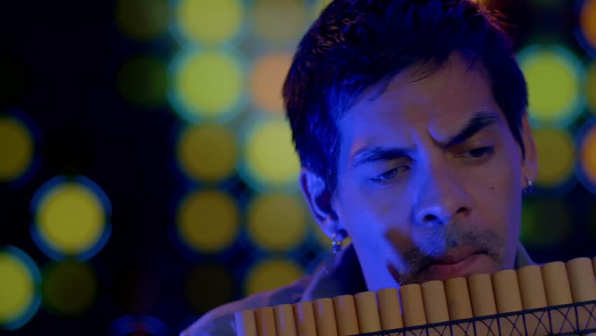 Close Up Shot Of Musician Playing Pan flute Instrument From Andes Of Peru And Bolivia Royalty-Free Stock Footage #1099245313