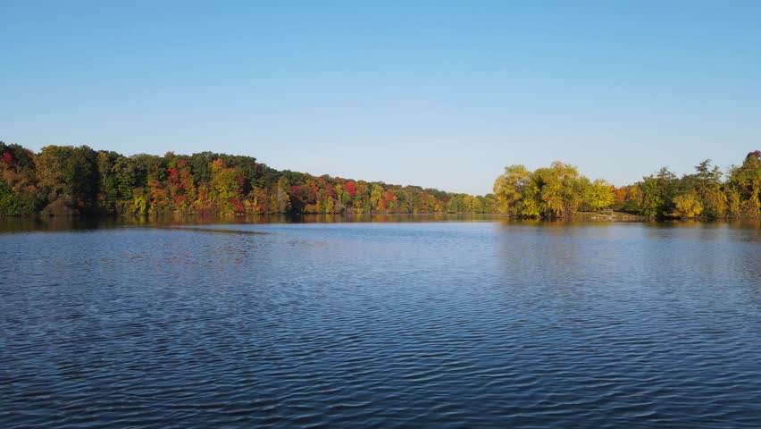 Drone Across Lake in Michigan Fall Colors