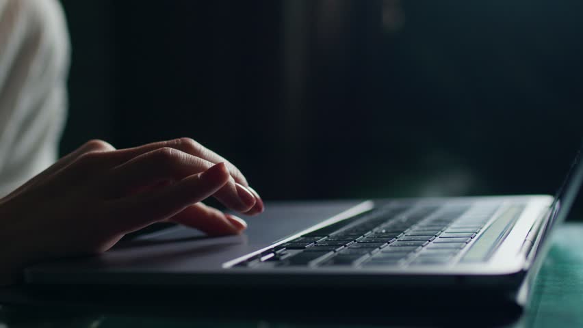 Female hands write text messages on a laptop keyboard close-up. Busy business woman emailing a client using a digital wireless handheld device remotely. Software, online education, apps, concept | Shutterstock HD Video #1099251943