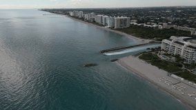 Aerial Perspective of a Boat's Journey through Florida Inlet: 4K Video