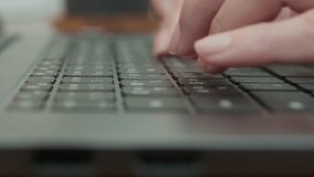 Close-up woman hand is typing laptop keyboard in home office

 - Powered by Shutterstock - Get 15% off with code: PIKWIZARD15