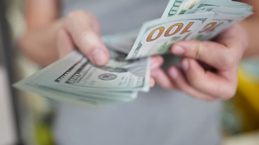Dollar money. bankrupt man lifestyle counting money cash. business crisis finance dollar concept. close-up of a hand counting paper dollars. exchange finance economy dollar usd | Shutterstock HD Video #1099264225
