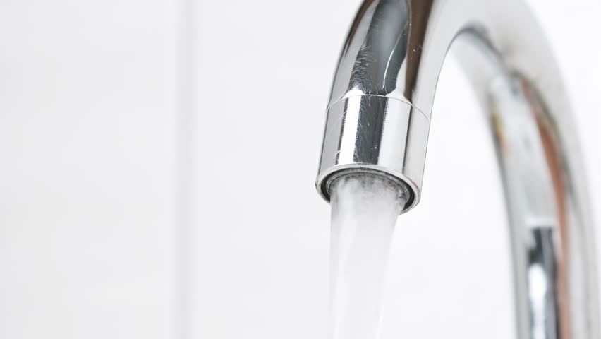 Water Flowing from the Tap in Bathroom. Macro Shot of Faucet. Turning On and Off Water for Using. Useful for Water Consumption, Ecological Problems and Drought Concept. Interior Real Time Prores 422. | Shutterstock HD Video #1099264823