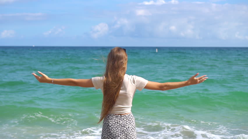 Happy young girl enjoy tropical beach vacation | Shutterstock HD Video #1099277205