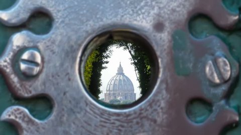 st.peter cathedral dome as seen from the famous hole of rome at Knights of Malta at cavalieri of malta square