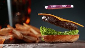 Beef Burger Ingredients Falling and Landing in the Bun, fire flames. Super Slow Motion at 1000 fps. - Powered by Shutterstock - Get 15% off with code: PIKWIZARD15