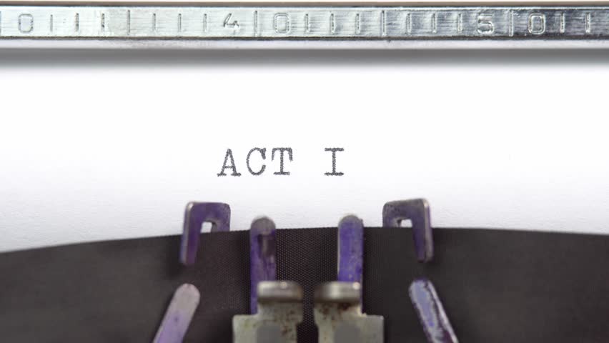 Act one word closeup being typing and centered on a sheet of paper on old vintage typewriter mechanical