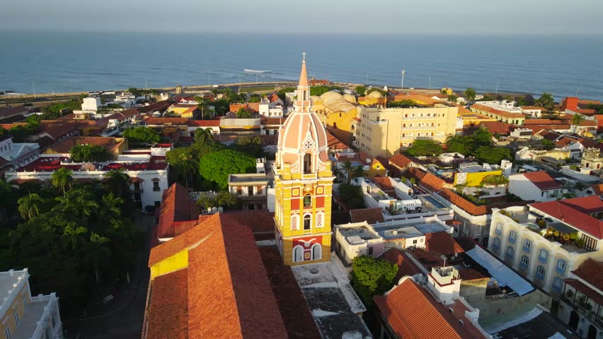 Aerial shot drone slowly ascending in front of Santo Domingo church at sunrise
