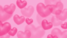 Looped background with flying blurred hearts. Pink cute background for Valentine's Day or Wedding