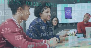 Animation of financial data processing over diverse business people in office. Global business, finance, computing and data processing concept digitally generated video.