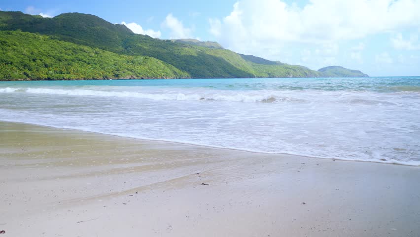 Tropical beach waves in Dominican Republic