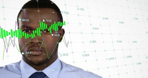 Animation of financial data processing over african american businessman. Global business, finance, computing and data processing concept digitally generated video.