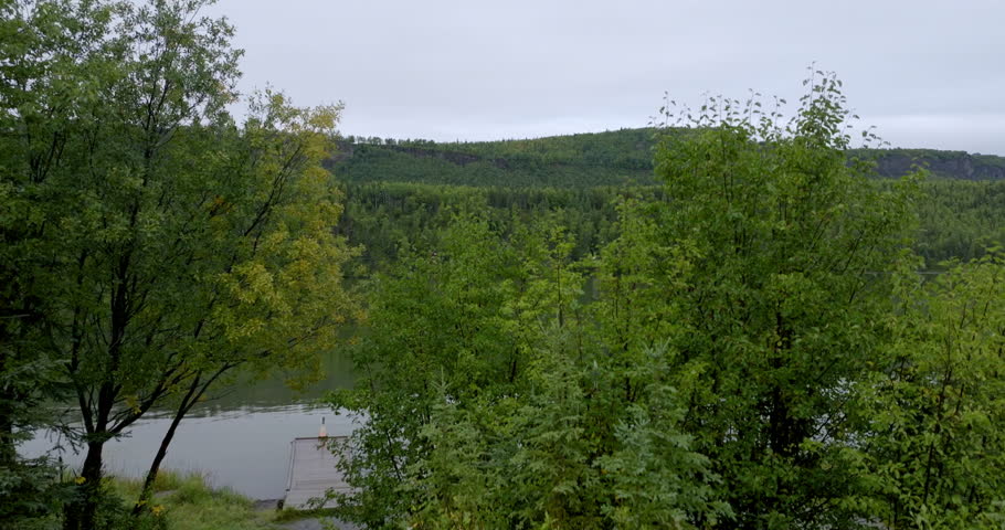 Aerial Upward Beautiful View Of Green Mountains, Drone Flying Forward Over River In National Park - Denali, Alaska
