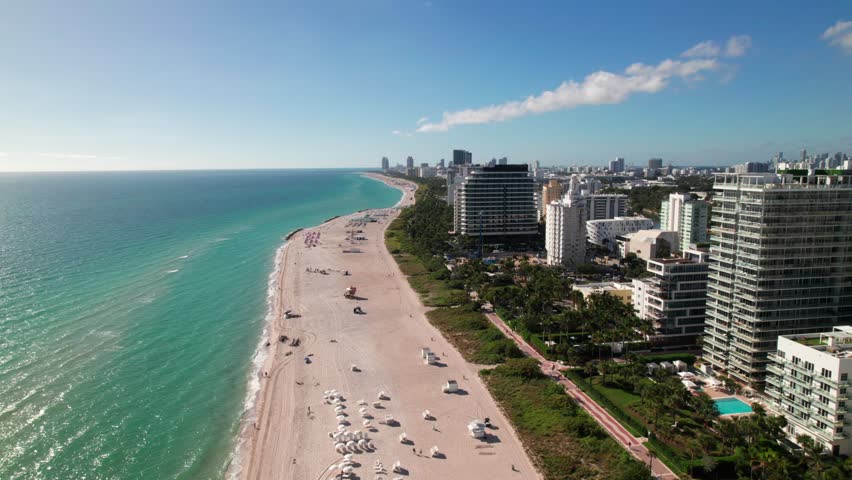 Beachfront in Miami Beach, tourist destination, Florida. 4K drone clip. Royalty-Free Stock Footage #1099319487