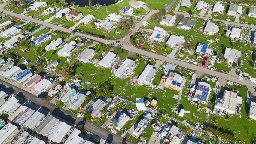 Destroyed by hurricane Ian suburban houses in Florida mobile home residential area. Consequences of natural disaster