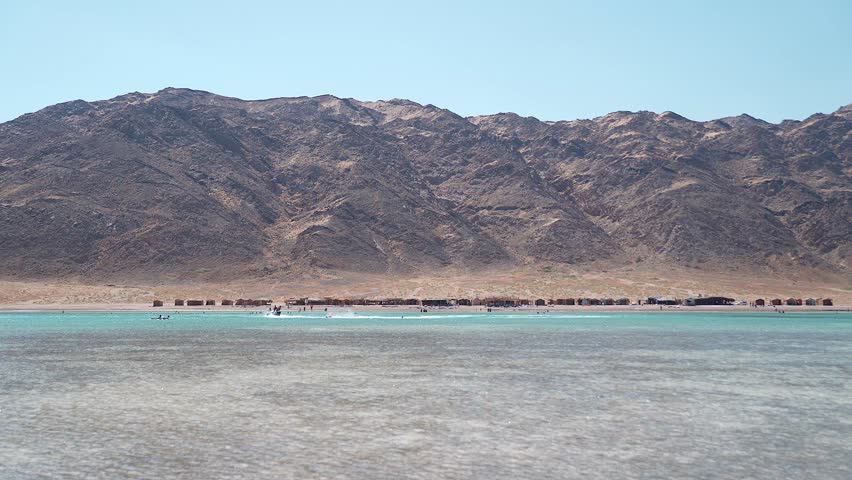Boat on Blue Lagoon with Mountain Views near Dahab, Red Sea, Sinai, Egypt