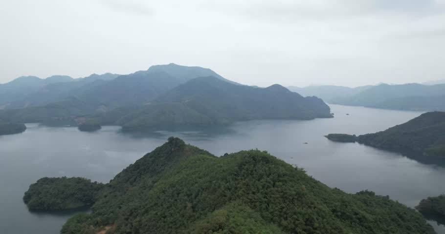 Drone footage, Nature landscape in Northern Vietnam, South East Asia nature scenery Skyview of river and mountains, lake, view from above, Thung Nai, Hoa Binh, Vietnam.