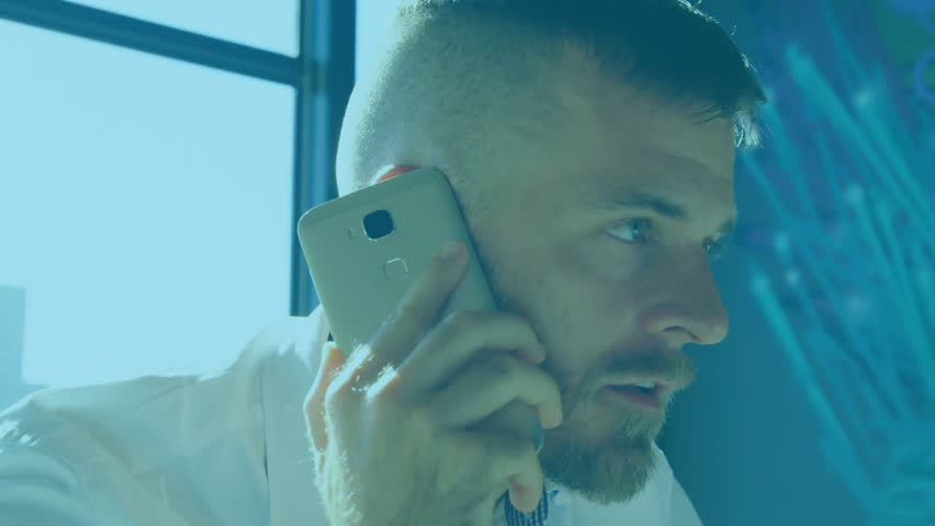 Animation of scope and data processing over caucasian businessman using smartphone. Global business, finance, computing and data processing concept digitally generated video.