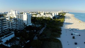 Miami South Beach. Aerial drone panorama view flight over Miami. Aerial landscape of scenic beach landscape at historic downtown district. Aerials of Miami Beach condominiums. 