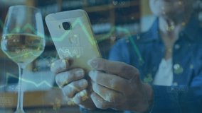 Animation of graphs and financial data over hand of caucasian man holding smartphone. Global technology data processing connections and digital interface concept digitally generated video. - Powered by Shutterstock - Get 15% off with code: PIKWIZARD15