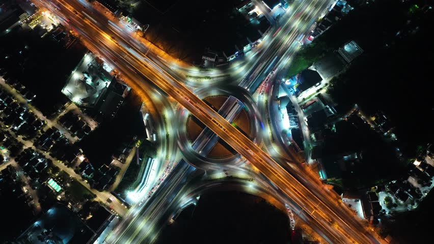 Hyper Lapse Aerial of Traffic Bangkok City Thailand Durning Night hour. Royalty-Free Stock Footage #1099351489