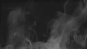 Steam Slowly Curls Over a Hot Surface. White steam rises light, graceful twists on a black background. The jet lifted out of the cup of hot water. Shooting at a rate of 120fps. Footage is perfect for  - Powered by Shutterstock - Get 15% off with code: PIKWIZARD15