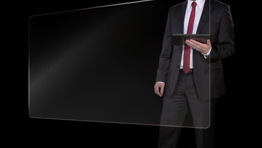 Businessman looking at stock market data charts