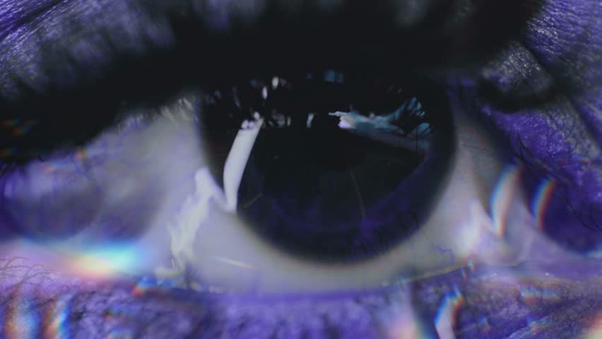 A macro shot of an eye with rainbow glass effect | Shutterstock HD Video #1099357453