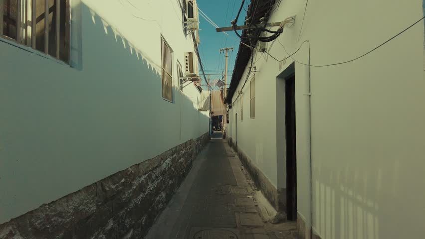 Urban street view with old buildings and stores in city of Suzhou in Jiangsu, China