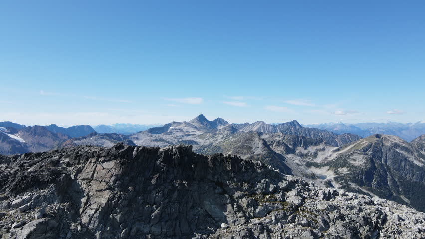 Mountain flyover mountain range blue sky