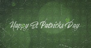 Animation of clover icons over happy st patrics day text on green background. St patrics day, tradition and celebration concept digitally generated video.