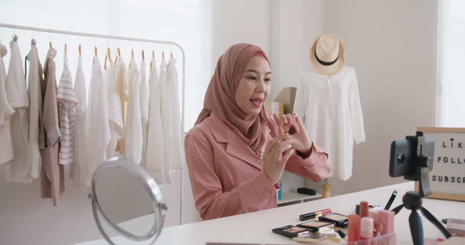 Islam youtuber arab influencer vlogger or beauty blogger live smile talk on social media vlog instagram. Show share selfie video sale online on small shop trendy job for asia people Gen Z young girl. Royalty-Free Stock Footage #1099381293