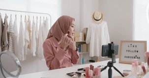 Islam r arab influencer vlogger or beauty blogger live smile talk on social media vlog  Show share selfie video sale online on small shop trendy job for asia people Gen Z young girl