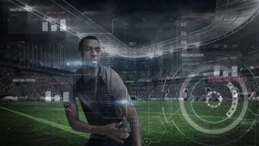 Animation of data processing over african american male rugby player at stadium. Global sports, connections, computing and data processing concept digitally generated video. - Powered by Shutterstock - Get 15% off with code: PIKWIZARD15
