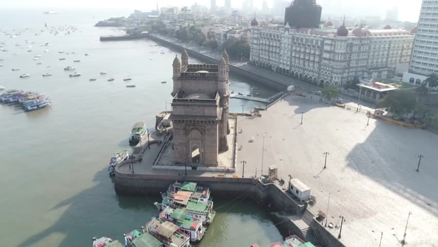 Aerial shot of the Gateway of India in Mumbai during Covid-19 Lockdown in India 
 Royalty-Free Stock Footage #1099383423