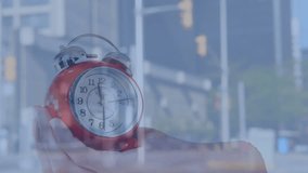 Animation of alarm clock, data processing over cityscape. Global business, finance, connections, computing and data processing concept digitally generated video. - Powered by Shutterstock - Get 15% off with code: PIKWIZARD15