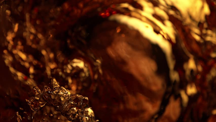 Super Slow Motion Abstract Shot of Bubbling Coffee Brown Liquid at 1000fps. Royalty-Free Stock Footage #1099389103