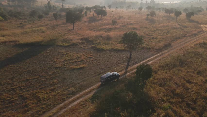 the aerial view of the SUV 4x4 vehicle driving on the off-road track