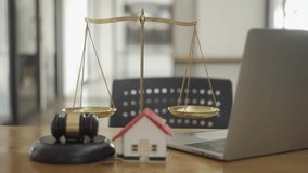 Real estate auction concept with house model and judge hammer scales for real estate foreclosure and home auction business judgment - Powered by Shutterstock - Get 15% off with code: PIKWIZARD15