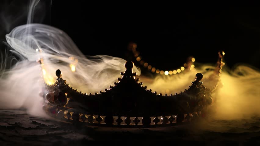 Fabulous golden crown of the king on a dark background. Panoramic view of the fog. Mockup for your logo. Royalty-Free Stock Footage #1099406955