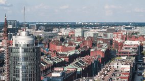 Establishing Aerial View Shot of Hamburg De, Mecklenburg-Western Pomerania, Germany, nice, sunny, day, roofs, tracking right