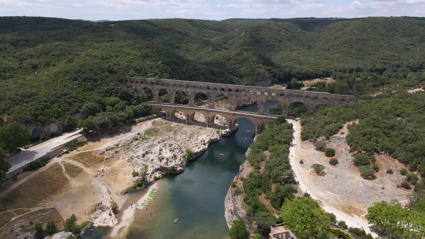 The Pont du Gard is a Roman aqueduct in southern France in the commune of Vers-Pont-du-Gard in the Gard department.