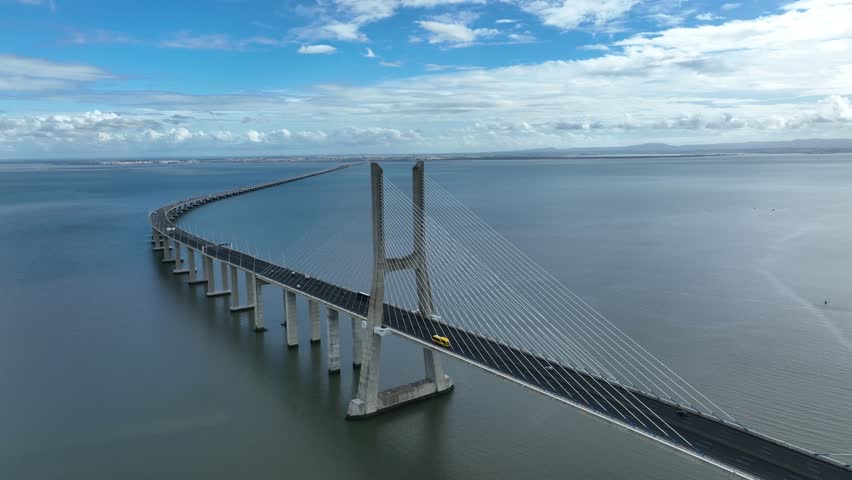 Vasco Da Gama Bridge in Lisbon, Portugal over the Tagus River. Drone Point of View. 4k