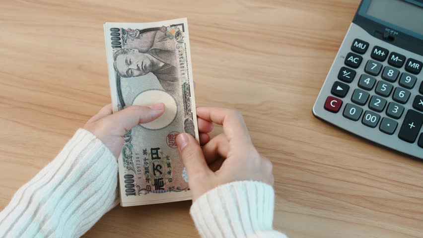 hand counting Japanese Yen banknote. Thousand Yen money. Japan cash, Tax, Recession Economy, Inflation, Investment, finance, savings, salary and payment concepts Royalty-Free Stock Footage #1099423027