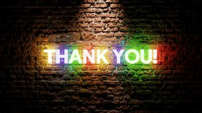 Neon sign animation thank you on a brick background. colorful neon sign thank you in suitable for store or video and etc. 4k looping video