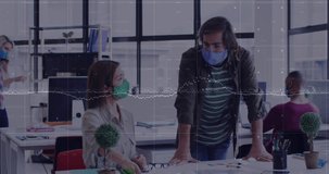 Animation of data processing over diverse business people with face masks working in office. Global business, pandemic and digital interface concept digitally generated video.