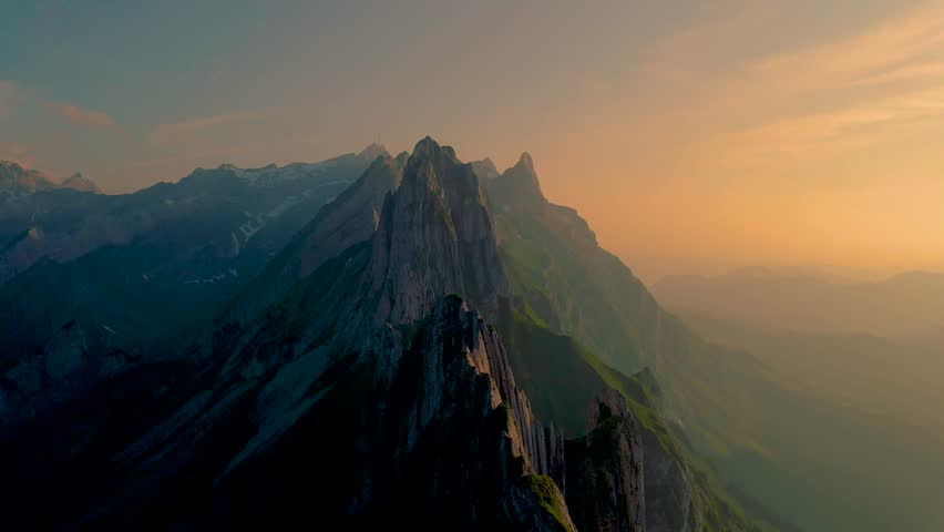Schaffler mountain ridge swiss Alpstein, Appenzell Switzerland, a steep ridge of the majestic Schaeffler peak, Switzerland at sunset | Shutterstock HD Video #1099429457